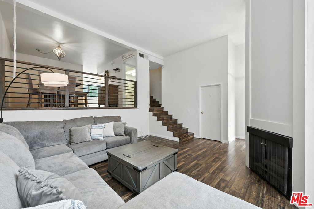 Welcome to this bright and spacious 3-bedroom, 2.5-bath townhome located in the highly sought-after Dove Creek community. With 1,764 square feet of comfortable living space, this thoughtfully designed home offers the perfect blend of functionality and warmthideal for families and entertaining alike.Enter through a private front patio into an open-concept layout filled with natural light. The mid-level dining area and guest powder room overlook a cozy living room featuring a gas fireplaceperfect for relaxed evenings and family time. The kitchen offers plenty of counter space and opens to a flexible bonus area with a wet bargreat as a breakfast nook, homework zone, or play area.Upstairs, the generous primary suite includes an ensuite bathroom with a walk-in shower and skylight. Two additional bedrooms share a full bathroom with a tub/shower combo, providing space for kids, guests, or a home office.Additional features include central air and heat, an attached 2-car garage with direct access and built-in storage, and in-unit laundry.Enjoy resort-style living surrounded by beautifully maintained grounds, year-round heated pools and spas, and tennis courts. Located just a short walk from The Village's vibrant dining and shopping scene, with convenient access to the 101 freeway, Ventura Blvd, and public transit, this home offers comfort, convenience, and community.