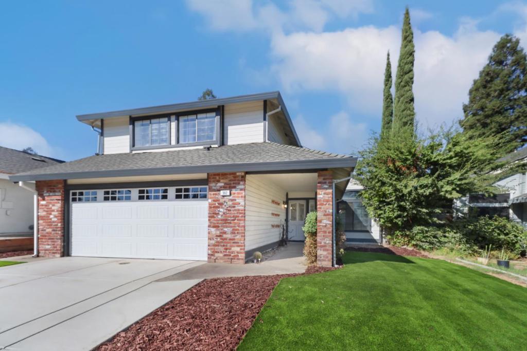 Dreaming of a home that blends modern luxury with suburban comfort? Welcome to this fully remodeled 4-bedroom, 3-bathroom, 2,216 sq. ft. Diamond Oaks gem! Step inside to light-filled spaces that effortlessly connect each room. The formal living and dining areas flow into a cozy family room with fireplace, while a sunny breakfast nook overlooks the backyard. The primary suite is a spa-like retreat, featuring a soaking tub and rain shower -- just not enough time to enjoy it all. Outside, enjoy a low-maintenance backyard with lush artificial turf, perfect for relaxing or entertaining. Recent upgrades include a brand-new garage door, driveway, and landscaping. Thoughtfully designed with modern finishes throughout, this home balances elegance, comfort, and effortless living -- dont miss your chance to make it yours!