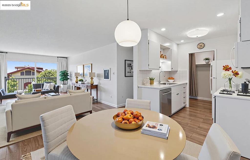 This Berkeley condo offers sparkling rooftop and Bay views with two large bedrooms in a prime location, just a scooter ride away from UC Berkeley's International House and steps from Memorial Stadium. It is an ideal home for students or investors. The unit features an open floor plan filled with natural light, a freshly painted interior, an updated kitchen with new countertops, great storage, and an in-unit washer/dryer. A spacious balcony spans the living room and bedrooms, overlooking Berkeley and offering breezy Bay views. The building provides keyed entry lobby or elevator access from a deeded parking space in the gated garage. It is also minutes from Downtown Berkeley and BART. Whether you're looking for a bohemian, urban, or academic lifestyle, this Berkeley property offers a perfect fit.