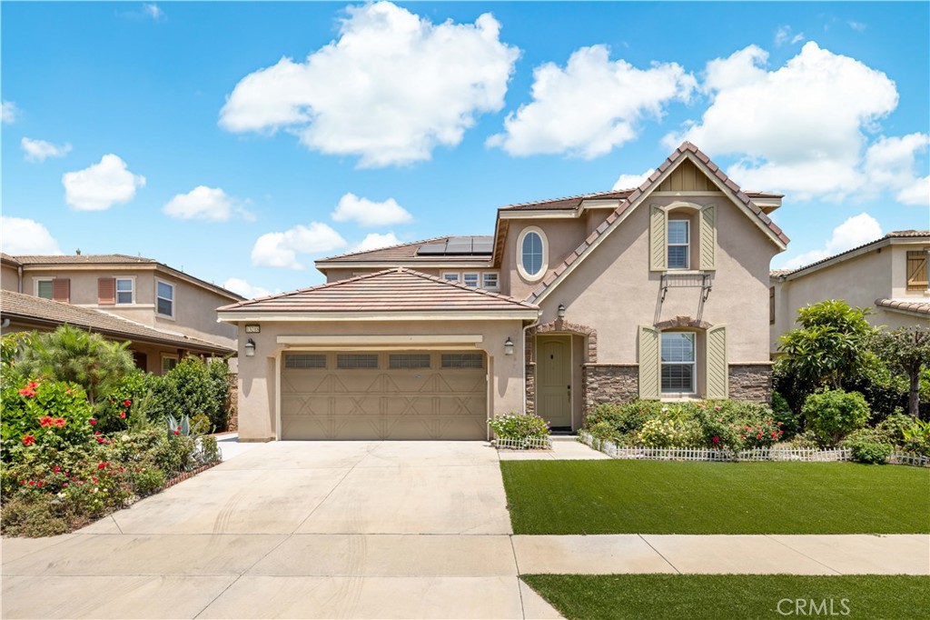 Welcome to one of the largest and most desirable homes in the exclusive gated community of Cornerstone! This beautifully maintained 4-bedroom, 4-bathroom residence offers an expansive 3,058 sqft of living space, situated on a generous 6,000 sqft lot. Built in 2015, this thoughtfully designed home combines modern comfort with timeless elegance. The first floor features a flexible multi-functional room that can serve as a formal living room, home office, or be enclosed to create a fifth bedroom if desired. A full bathroom downstairs adds convenience, making it ideal for guests or multi-generational living. The open-concept layout centers around a gourmet kitchen featuring stainless steel appliances, granite countertops, an oversized island, and a walk-in pantry, connecting to the spacious dining and living areas. Upstairs, you'll find all four generously sized bedrooms, including a luxurious primary suite with dual sinks, a soaking tub, walk-in shower, and a large walk-in closet. There are two other full bathrooms upstairs plus a spacious loft, offering convenience and comfort for every household member. The backyard is low-maintenance and highly usable, offering the perfect space for outdoor relaxation or entertaining. As part of the Cornerstone community, residents enjoy resort-style amenities including a sparkling pool, spa, BBQ area, clubhouse, and park, all with a low HOA and 24/7 gated security. Centrally located near award-winning schools, Victoria Gardens, Ontario Mills, and easy freeway access, this exceptional home offers both space and convenience. Don’t miss your chance to own one of the community’s most spacious and sought-after floor plans. Schedule your private tour today!
