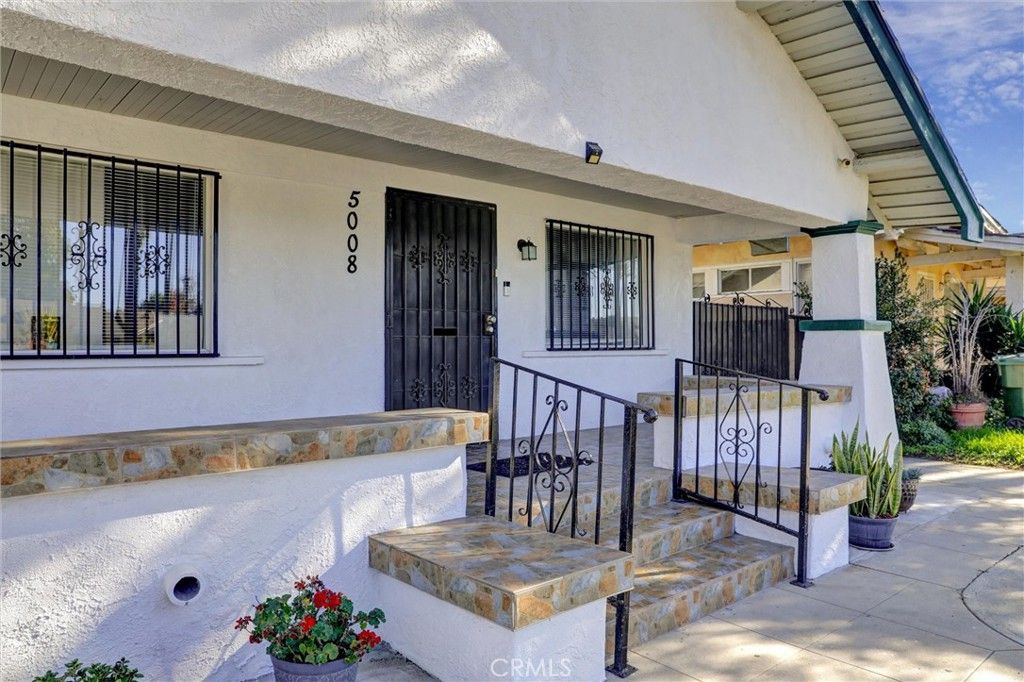 Photo of 5008 Cimarron, Los Angeles, CA 90062 (MLS # RS25275404)