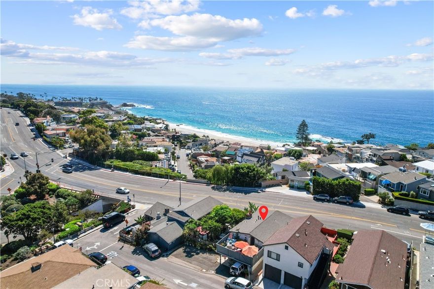 Location-LOCAtion-LOCATION! With 7 miles of Marine Protected Area, Laguna Beach is a pristine protected coastline featuring a large percentage of one-of-a-kind specialty shops and boutiques, and more beachfront lodging than any other city in California.  Whether you are looking to relax in early spring with pleasant weather and fewer people, or hang out with the tourist and larger crowds in the summer....this home is located centrally to enjoy it all.  A less than 5 minute walk will land you to one of the most unique beaches named Victoria Beach.  The relatively large cove beach offers fun features such as a pool on the sand, sea caves, tide pools, and volleyball courts.  Now let’s describe the duplex!  Each unit, one downstairs and one upstairs features its own entrances from the rear on Solana and from the front on Coast Hwy.  Both units offer a welcoming layout with 2 bedrooms and 1 bath each.  The upstairs unit offer high ceiling in the living room with jaw dropping views of the coastline.  Both units offer outdoor space to relax and enjoy the beach life.  Whether you choose to live in one and lease the other, live in both, or lease both.....the investment in this duplex should be exceptionally rewarding!