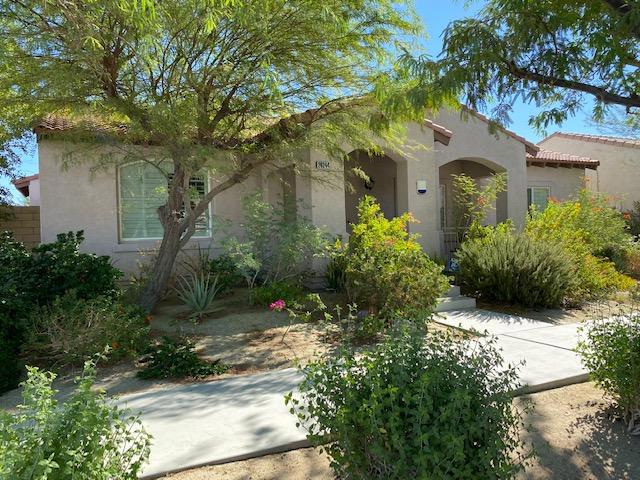 A chance to live in the highly sought after Verano community! This Stunning single level, Mediterranean home with a great room, den, dining room, and spacious master suite that includes a large bath and two large walk-in closets! Custom tile flooring from the entry to the rear patio and kitchen, with brand new flooring in all bedrooms and living areas and ceiling fans throughout the home, Window coverings and shutters makes it move in ready. Kitchen amenities include gas range, microwave hood, dishwasher, granite countertops adjacent pantry and laundry room. The oversized double car garage with room for additional storage or workbench. The rear private yard with a gas firepit area, all covered by the large custom solid wood trellis, mature landscaping. This home provides ample parking with a 2 car garage and extra curbside parking in front and is adjacent to mailboxes with common area in between. Located within walking distance of highly acclaimed Rio Vista Elementary School, just 5 minutes away from shopping, golf course, and walking distance to the gated private sports grass area and children play yard and newly renovated community clubhouse, gym, pool and other amenities