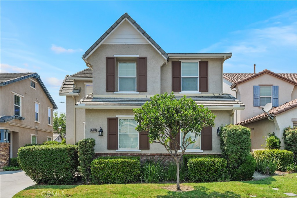 Welcome to Your Dream Home in Skyview Ridge!
If you’ve been searching for a move-in ready, beautifully upgraded 3-bedroom home with a spacious loft (easily a 4th bedroom!), your wait is over. Nestled in the highly sought-after Skyview Ridge community, this former model home is loaded with designer touches and modern updates throughout.
From the moment you step inside, you’ll be wowed by the grand vaulted ceiling and elegant wrought iron staircase that sets the tone for the rest of this stunning space. Just off the foyer is a warm and welcoming living room with chic wrought iron scrollwork—perfect for entertaining in style.
Flow seamlessly into the open-concept family room where a cozy gas fireplace invites you to kick back and relax. It’s the ideal spot for movie nights or festive gatherings. The dining area features rich wainscoting and a wide sliding door that opens up to your private, tranquil backyard oasis.
The kitchen is truly a chef’s delight—boasting stainless steel appliances, granite countertops, ample cabinetry, recessed lighting, and gorgeous Italian porcelain tile underfoot. Whether you’re whipping up a gourmet meal or enjoying pancakes at the oversized breakfast bar, this space blends form and function with ease.
Downstairs also features a spacious powder room with a custom stained concrete and an oversized two-car garage—offering plenty of room for parking, storage, or your next DIY project.
Upstairs, you’ll find a bright and airy loft space, ideal as a home office, game room, or easily convertible to a fourth bedroom. The expansive primary suite is a private retreat with crown molding, a ceiling fan, and abundant natural light. The spa-like en-suite bath features a large soaking tub, walk-in shower, dual sinks with granite counters, and a customized walk-in closet.
Two additional generous bedrooms, a full-size laundry room, and a dual-sink hall bath complete the upper level.
Step outside and fall in love with the lush, peaceful backyard—ideal for relaxing under the sun, enjoying quiet evenings, or creating lasting memories with loved ones.
And don’t forget the resort-style living! Enjoy two community pools and spas, a toddler playground, outdoor showers, and park areas—all with front yard maintenance included. Plus, you’re just minutes from top-rated schools, shopping, dining, and easy freeway access.
This turnkey beauty won't last—come see why this model-perfect gem is the one you've been waiting for!