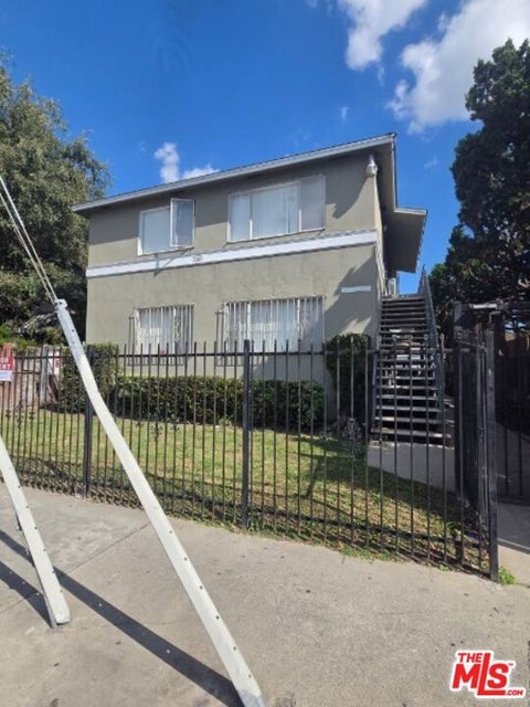 Photo of 7906 S San Pedro Street #3, Los Angeles, CA 90003 (MLS # 26104279)