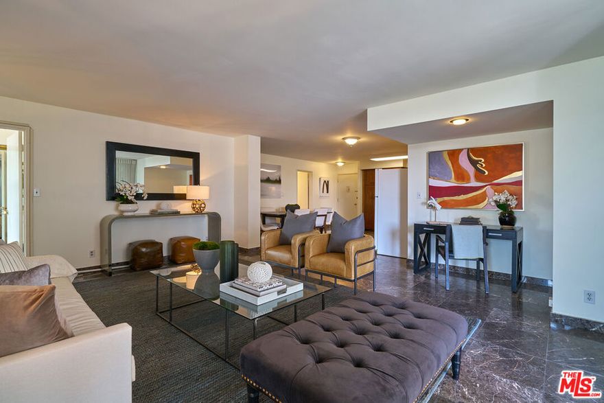 Why stay at the Waldorf Astoria when you can own this exquisite Beverly Hills Pied--Terre? Nestled in the heart of Beverly Hills, this remarkable condo offers the ultimate convenience, with the Waldorf Astoria, The Peninsula Hotel, and Rodeo Drive all just minutes away. Indulge in the finest shopping and dining experiences, or take a short five-minute drive to the spectacular Westfield Century City Mall. Proximity to West Hollywood, Soho House, and other iconic locations adds to the allure. The condo's spacious open floor plan is bathed in natural light, offering fantastic versatility for entertaining, dining, or even working from home. The building boasts secure entry, gated parking, a rooftop pool, BBQ area, and lounge with breathtaking views of Beverly Hills and Century City. With stunning upgrades, this property is perfect for an owner-occupier or as a savvy investment rental unit. BONUS ALERT: This property is located within the esteemed Beverly Hills School District, adding tremendous value for families.  Building is being painted, new landscaping, and lighting and will be stunning. Don't Miss your chance!!! (Please note these photos are from previous listing)