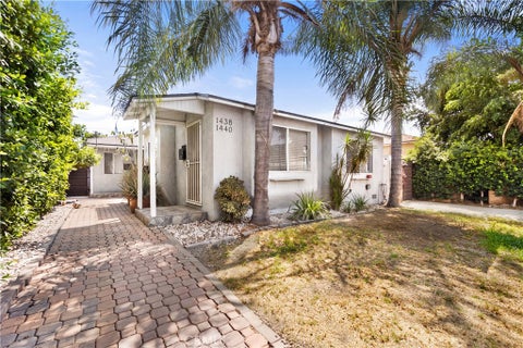 Photo of 1438 S Woods AVE, Los Angeles, CA 90022 (MLS # DW26181781)
