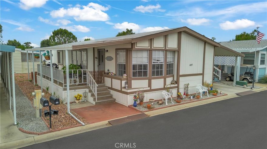 Welcome to 5001 W. Florida Ave #697 — a spacious and well-maintained 2-bedroom, 2-bathroom manufactured home located in The Lakes at Hemet West, one of Hemet’s most sought-after 55+ gated communities. With 1,440 sq ft of thoughtfully designed living space, this inviting home offers the perfect blend of comfort, convenience, and access to resort-style amenities right outside your door.



Inside, you’ll find a bright and open floor plan, generous room sizes, and a seamless flow between the living, dining, and kitchen areas — ideal for both entertaining and everyday living. The primary suite features a private bath, and there’s a dedicated laundry area for added convenience. A private patio space and covered parking round out the home’s practical appeal.



Step outside and experience the vibrant lifestyle that makes The Lakes at Hemet West truly special. This gated, active adult community is surrounded by lush landscaping, peaceful lakes, and tree-lined walking trails — and offers a wide array of amenities including:



9-hole executive golf course



Heated, year-round pool with cascading waterfalls



Jacuzzi spa



Catch-and-release fishing lakes and even a turtle habitat



RV storage options



Dog park and pet-friendly walking paths



Horsehoe pits, pickleball, bocce ball, and shuffleboard courts



Outdoor grill & BBQ area



At the heart of the community is a vibrant clubhouse with something for everyone — including a library, billiards room, game room, card tables, ceramics room, small gym, full-service kitchen, event space, and laundry facilities. From Taco Tuesdays to craft fairs, dances, luncheons, and even an annual kids’ fishing derby, the social calendar here is as active as you want it to be.



Whether you're looking for peaceful surroundings or a lively, amenity-rich lifestyle, this move-in-ready home offers it all. Schedule your private showing today and discover why The Lakes at Hemet West is one of the region’s premier destinations for active senior living.