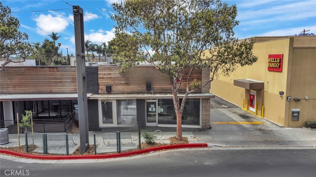 This prime office space offers five private offices, a large conference room, and a mezzanine for additional storage, making it ideal for a range of professional uses. Located in a high-visibility commercial area with ample on-site parking, the property provides convenient access to nearby banks, restaurants, and major retail stores.