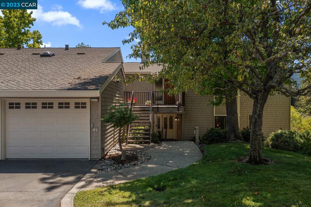 In a single word, "Wow!" This rarely available Woodbridge model makes downsizing easy! With over 1800 SF, this manor offers the flow and creature comforts of a single-family home: generously sized rooms, formal dining room, eat-in kitchen, separate den/office (in lieu of third bedroom), laundry room, interior access to garage with storage loft, separate carport, abundant built-ins and storage, walk-in closet, extra large en suite primary bathroom, and more! Enjoy unobstructed golf course views from the kitchen, dining room, living room and primary bedroom - savor your morning cup of coffee while watching golfers tee off! Wonderful end of entry location offers excellent privacy! With over $250,000 of upgrades, the manor was extensively remodelled in 2007-2008 by premier contractor, Toupin Construction. Custom upgrades include bullnose corners, crown molding, recessed lighting, solid core doors, plantation shutters, and radiant floorheat in bathrooms. Hardwood floors in main living areas. Direct access to the deck from dining and living rooms makes this manor perfect for entertaining! This manor has it all - don't miss it!