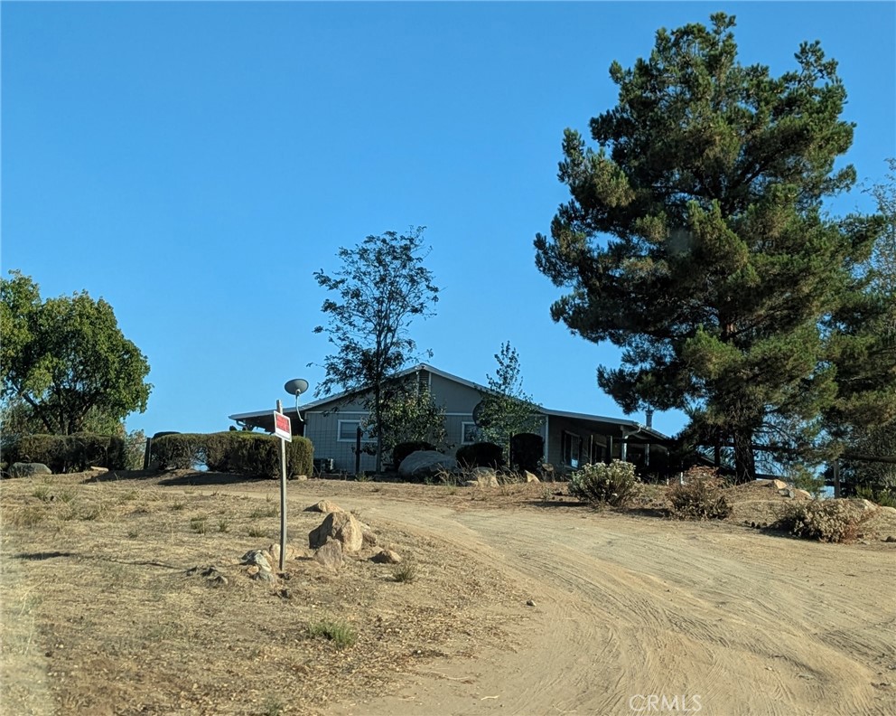 INVESTMENT OPPORTUNITY !! ATTENTION DEVELOPERS !! MURRIETA near shopping at Costco, Vista Murrieta High School and EZ Access to Hwy 215.
2.12 ACRES in the HEART of current developments of Multi-Family Dwellings! LOCATION, LOCATION, LOCATION! JUST 4 LOTS NORTH FROM THE NEW TRAFFIC SIGNAL ON THE EXPANDED CLINTON KEITH ROAD X ARENDT LANE. BETWEEN SIGNALS AT WHITEWOOD AND MENIFEE RD. New Developments all around the area in progress and in Murrieta Planning Dept awaiting approval. Current Developer nearby will be paving access from Clinton Keith Rd onto Arendt Lane. There is a Custom Home on the property that could be lived in or used for Construction Office ? or Rental ? Or ?, while you are in Planning. Don't let this one get away from you!! Nearby properties are also available. Currently zoned RO2, for 6-10 Units per ac