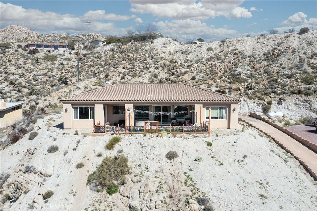 Photo of 57474 Airway Ave, Yucca Valley, CA 92284 (MLS # JT26063416)