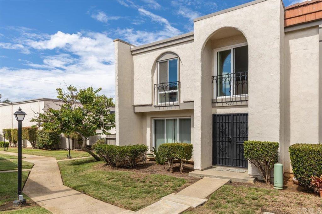 Welcome to 5273 Mt Alifan Drive in vibrant San Diego, CA! Nestled within the sought-after Pacific Bluffs community, Clairemont's hidden gem. This spacious single-family attached home boasts one of the largest floor plans available, a layout that rarely graces the market. Step inside to discover a beautifully maintained residence featuring four generous bedrooms and three well-appointed bathrooms. Spanning 1,892 square feet, this home offers ample space for comfortable living. The recently updated kitchen is a true delight, showcasing new appliances and fresh paint, all complemented by laminate flooring that extends into the dining area. The inviting dining area is enhanced by a cozy fireplace, perfect for hosting gatherings or enjoying a quiet evening. Practicality meets style with the inclusion of a pantry and a dedicated laundry room, complete with a washer and dryer. Sunlight streams through dual-pane windows and two large sliding doors in the upstairs bedrooms, creating a bright and airy ambiance. Unique features like sliding barn doors in the kitchen and main floor bedroom add a touch of rustic charm. The home's functional design includes a very large storage area under the stairs, a convenient half bath downstairs, and two full baths upstairs, including the main bedroom. Step outside to your private retreat—a large patio with a built-in storage shed and an outdoor bar counter seamlessly connected to the kitchen window. The property also offers a two-car covered carport, ensuring ample parking space. Living here, you are conveniently located near a variety of restaurants and shopping options, making daily life a breeze. Plus, the proximity to the beach allows you to enjoy sun-soaked days by the ocean with ease. Residents of Pacific Bluffs enjoy an abundance of amenities, including an Olympic-sized pool, children's pool, a brand-new playground, and a spacious clubhouse with a kitchen, reading room, game room, and gym. Outdoor enthusiasts will appreciate the grills with picnic areas, shuffleboard, and more. The community also conveniently includes cable with Disney and HBO, along with internet services. This home is more than just a residence; it's a lifestyle destination awaiting its next chapter. Don't miss the opportunity to make this rare gem yours!