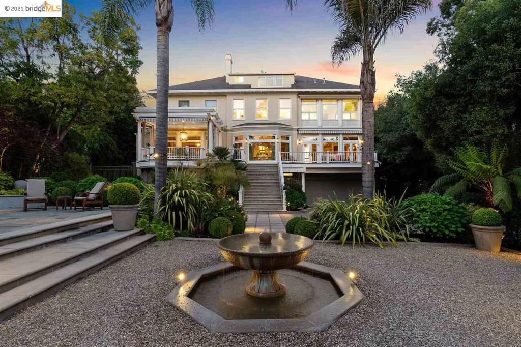 Grand Piedmont traditional home sited on an expansive lot with resort-like grounds; and seamlessly combines classic elegance with curated modern luxury. Elegant foyer with dramatic 11-foot ceilings and formal living room, dining room, family room all with French doors opening to the back terrace with spectacular glass atrium overlooking the private lawn and gardens. Show-stopping kitchen equipped with an oversized island, wet bar and family room providing the best in form and function. The main level is completed with 2 powder rooms and 2 offices. The second floor offers the dramatic primary bedroom suite with marble bath, dual vanities and dressing rooms and three graciously sized ensuite bedrooms. The third floor offers a fourth and/or fifth bedroom with abundant closets. The lower level includes recreation room, wine cellar, caterer’s kitchen, three attached garage stalls, and large storage room. The private lawn and gardens offer a spa, cabana/lounge area, and major specimen trees.