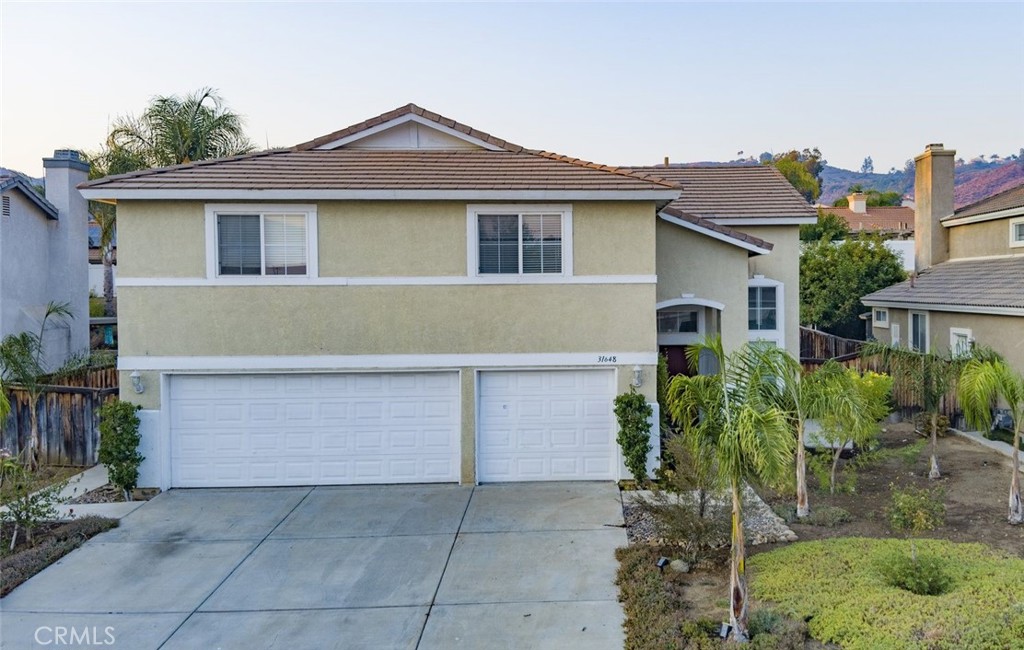 Beautiful 4BR/3BA home in Lake Elsinore with 2,671 sq. ft. on a 7,409 sq. ft. lot. Built in 2000, this home features a 3-car garage, an open floor plan, formal living/dining, a family room with a fireplace, a main-level bedroom & bath, and a spacious kitchen. Large backyard, no HOA, close to schools, shopping & freeway access.