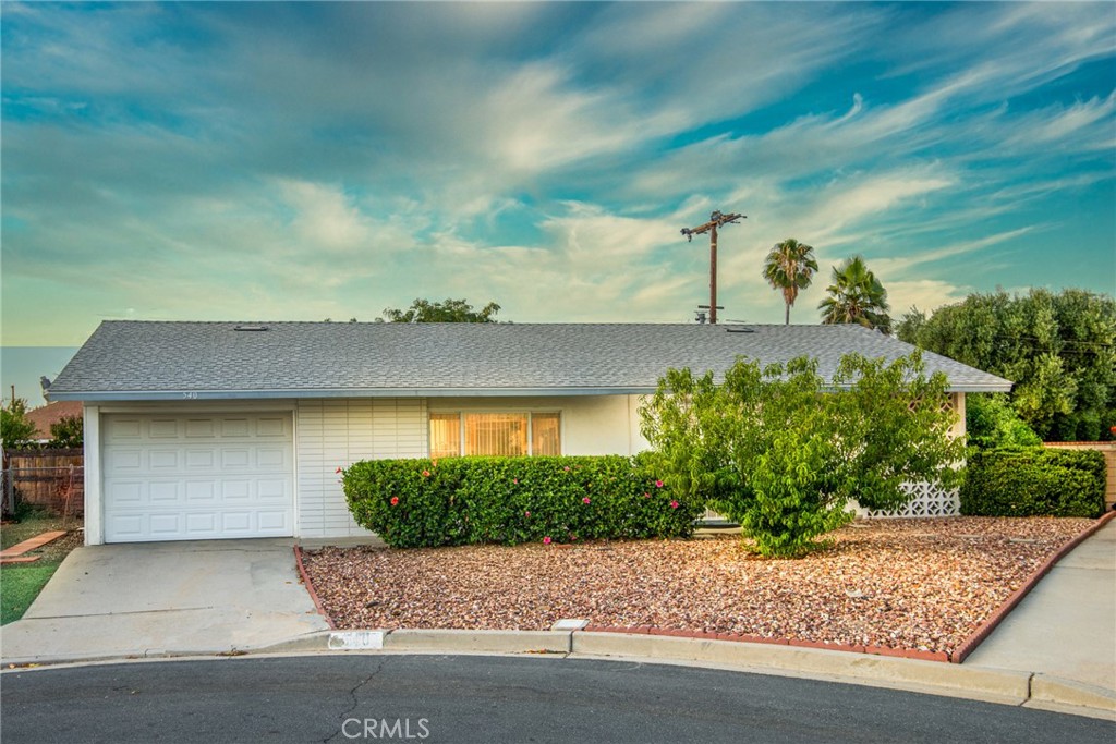 Check out this fantastic opportunity to own this spacious 2 bedroom/1 bath home with functional floor plan located on a quiet cul-de-sac in a 55+ community in south Hemet. You'll enter this cute home walking past a beautiful hibiscus hedge, through the upgraded front door with leaded glass panel into a large living room area. The kitchen has plenty of storage and durable tile counters which opens into a formal dining room with space for a large table. Two roomy bedrooms are suitable for large beds and the hall bathroom features a tub/shower with spacious vanity counter. The laundry is located in its own room rather than the garage as is common in homes this size. The property features a large backyard with numerous fruit trees and a nice covered patio to enjoy our areas beautiful weather. There is a greenhouse in the backyard for those who love to garden. Best of all, this lovely home features brand new HVAC system AND a new roof! This home is located walking distance to shopping AND the local DMV! Also, access to Domenigoni Parkway is a just a few minutes away which makes access to I-215 a breeze. Hurry, this home won't last.