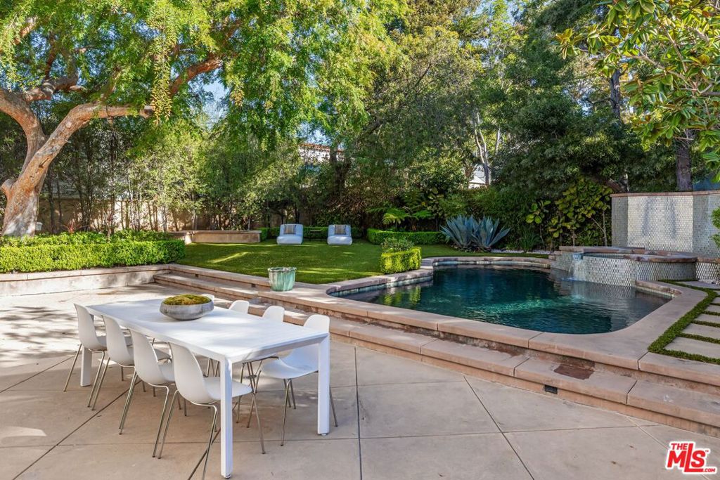 North of Montana, custom built home in prime Santa Monica with an open floor-plan on a large 9,000 square foot lot boasting 6 en-suite bedrooms and 6.5 bathrooms. Ideal for a family, the home offers 5,800 square feet of living space with an ideal layout, 4 bedrooms upstairs, a 5th bedroom on the main level, plus a 6th bedroom on the lower level. The extra large primary bedroom has its own seating area and large bathroom and walk-in closet. The home also has a huge dining room and step down formal living room ideal for entertaining. The massive kitchen with center island opens to an inviting family room with wet bar and doors leading out to the outdoor fireplace and backyard. The grassy oversized backyard for the area is an entertainers paradise with pool, jacuzzi, patio space and plenty of privacy due to the mature and lush landscaping. Franklin School District. Come see it before it's gone.