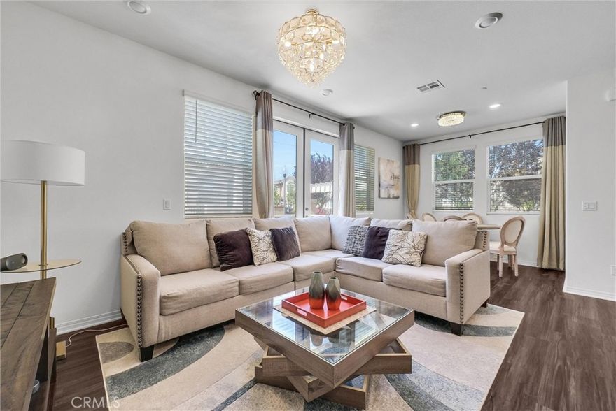 Welcome to a charming newer Townhome situated in convenient location of Chino. Preserves offers a spacious 1668 sqft the living area. Step inside to discover a thoughtfully designed interior featuring a cozy living room and A open modern Kitchen opens onto a perfect size backyard for BBQ and relaxing.  This stunning home features 3-bedroom, 2.5-bathroom, The primary suite is a true retreat, boasting a generous layout and a large walk-in closet, complete with a private bedroom, an suite bathroom and two other cozy rooms with a full bathroom and a separate walk-in laundry room. A large loft for family entertainment or home office used. attached two car garage with a built in electrical car charger.  The features including lower cost  the Lease Solar System, Buyer to assume Solar lease. Don't miss out on this one!