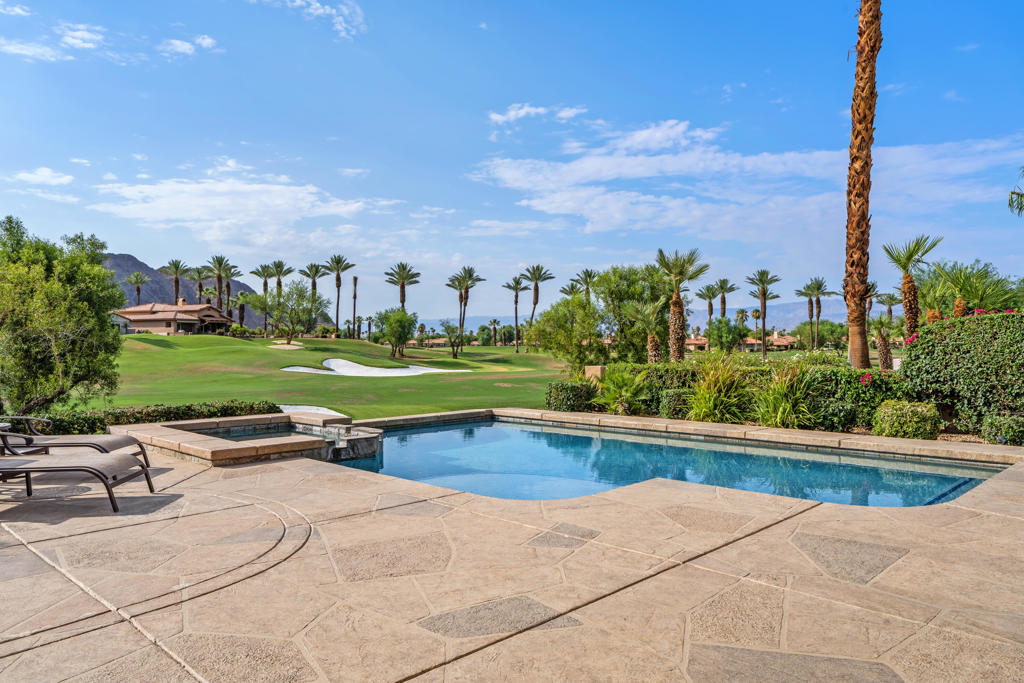 Perched above the 3rd fairway of the renowned Jones Course, this stunning Terraza II residence offers more than a home--it offers a perspective. Here, panoramic views of the Santa Rosa Mountains serve as your daily masterpiece, creating a breathtaking backdrop for legendary evening sunsets. This is the quintessential Rancho La Quinta lifestyle realized. The main residence features two bedrooms and two-and-a-half baths. Engineered wood flooring graces the living areas, where soaring high ceilings amplify the sense of light and space. The property's generous layout is further enhanced by a desirable detached casita, a private sanctuary offering two additional bedrooms connected by a Jack and Jill bath--perfect for hosting esteemed guests or creating a private executive office. Offered turnkey furnished, this residence allows for an immediate transition into your coveted desert life. Beyond the threshold, you own a stake in one of the desert's most sought after communities. As a resident, you are perfectly positioned to enjoy the much-anticipated Rancho La Quinta Country Club renovation, slated for completion mid-season. This transformation will further elevate a club already synonymous with world-class amenities and an exclusive social calendar. This is a rare opportunity to acquire an elevated viewpoint within an unparalleled setting.