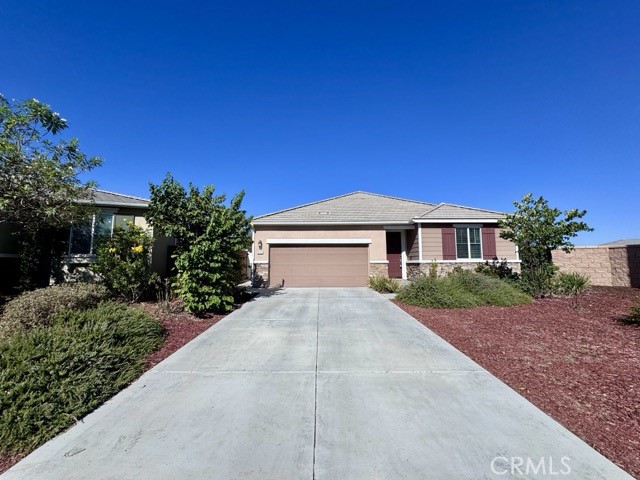 Discover This Exceptional Single Story Home with Solar in Menifee’s Meadow Run Community! Built in 2021 and thoughtfully upgraded, this stylish home offers a spacious open concept layout with modern finishes throughout. Inside, you’ll find upgraded flooring, sleek quartz countertops, and a custom tile backsplash that elevate the kitchen and living spaces with a contemporary touch. The kitchen seamlessly opens to the dining and living areas, complete with beautiful shutters for a polished look. The primary suite is conveniently located off the main living area and features a spacious bedroom with an ensuite bathroom, including dual sinks, a walk-in shower, and an oversized walk-in closet. The additional bedrooms are generously sized and thoughtfully placed for comfort and privacy. A dedicated laundry room, complete with a washer and dryer, adds extra convenience. The expansive backyard is a true highlight, offering a large side yard, low-maintenance artificial turf, an extended concrete open patio and a large playset for added enjoyment. Ideally located near Paloma High School, shopping, dining, MSJC, and freeway access, this home combines style, function, and an unbeatable location. Don’t miss your chance to lease this move-in ready gem in one of Menifee’s most desirable neighborhoods!