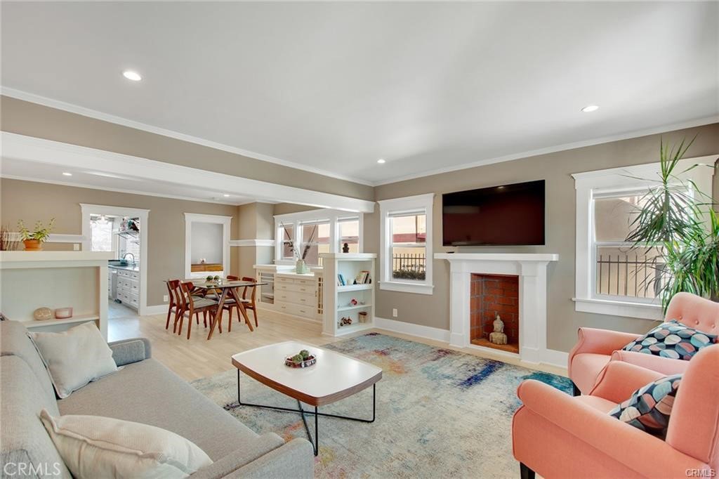 This beautiful Hollywood Sunset apartment offers a front row view of the Hollywood Sign and everything LA has to offer. Stunning 2-bedroom 1-bathroom offers wooden flooring throughout the unit, with mosaic flooring in the bathroom, stainless steel kitchen appliances (stove, refrigerator, and microwave), and a washer and dryer inside the unit. This layout offers 2 walk-in closets, plenty of storage space, custom white kitchen cabinets (fully remodeled), and a patio space looking over the amazing view of Los Angeles and Hollywood. This home is perfect if you're looking for an aesthetic. 2nd bedroom is smaller and can be used as an office or nursery. Unit is unfurnished, but can be partially or fully furnished for an additional charge. Water & Gardner. Prime location offering convenience to multiple shopping centers, restaurants, grocery stores, Downtown LA, and Hollywood. Located just walking distance from the Sunset Strip!