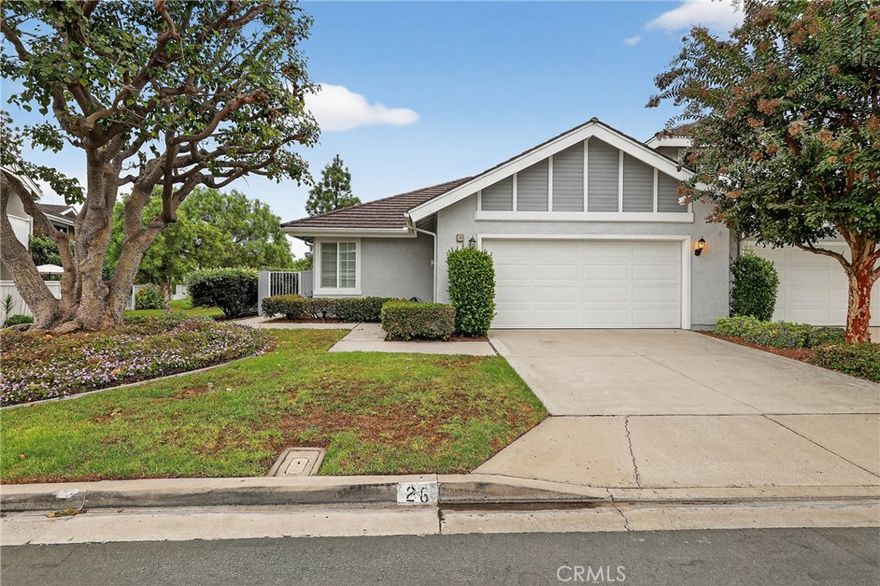Tucked within Irvine’s sought-after Woodbridge community, this beautifully maintained single-level residence blends comfort, privacy, and timeless style. The flexible floor plan features two spacious bedrooms, two full baths, and a versatile bonus area perfect for a home office, fitness studio, or more. Sunlight fills the open-concept living and dining spaces, complemented by brand new carpet, wood flooring and inviting views of the surrounding garden. The updated kitchen is both functional and elegant, with sleek stainless steel appliances and thoughtful design details throughout. The primary suite offers a peaceful retreat with dual vanities, a walk-in shower, and a generous closet. Outside, the home’s enchanting French country-inspired garden and central atrium create a serene atmosphere rarely found in Irvine. With no neighboring homes on three sides and a private community park directly behind, the setting feels like your own secluded escape. Ideally located within walking distance to North Lake, award-winning schools, and resort-style amenities — including pools, tennis courts, and more — this residence perfectly captures the best of Irvine living.