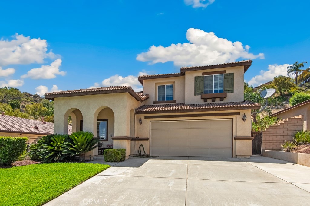 Welcome to this spacious 5-bedroom, 3-bath home in the heart of Lake Elsinore, perfectly
situated on an oversized lot with breathtaking lake views! Thoughtfully designed for comfort
and flexibility, this home features a desirable first-floor bedroom and full bath—ideal for guests
or multigenerational living. Step inside to find light-filled interiors with soaring two-story ceilings
and an open-concept kitchen and living room that create a seamless flow for everyday living
and entertaining. Meander outside to your private backyard retreat featuring a large patio,
terraced entertaining deck with panoramic lake views, and plenty of space for gardening or
outdoor relaxation. Whether you're hosting friends or enjoying a quiet evening under the stars,
this home offers the perfect blend of indoor-outdoor living in a beautiful natural setting. Bonus
features, whole house water softener system and PAID OFF SOLAR!!!