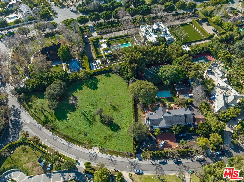 A Rare Opportunity. First time available in decades. 56,000sqft+ lot on the most prime street in estate section of Beverly Hills. Minutes to Rodeo Drive and Beverly Hills Hotel. Incredible trees dot a verdant landscape. Once in a generation does a lot of this importance and magnitude come to market. A spectacular backdrop for a new major estate. Shown only to prequalified buyers.