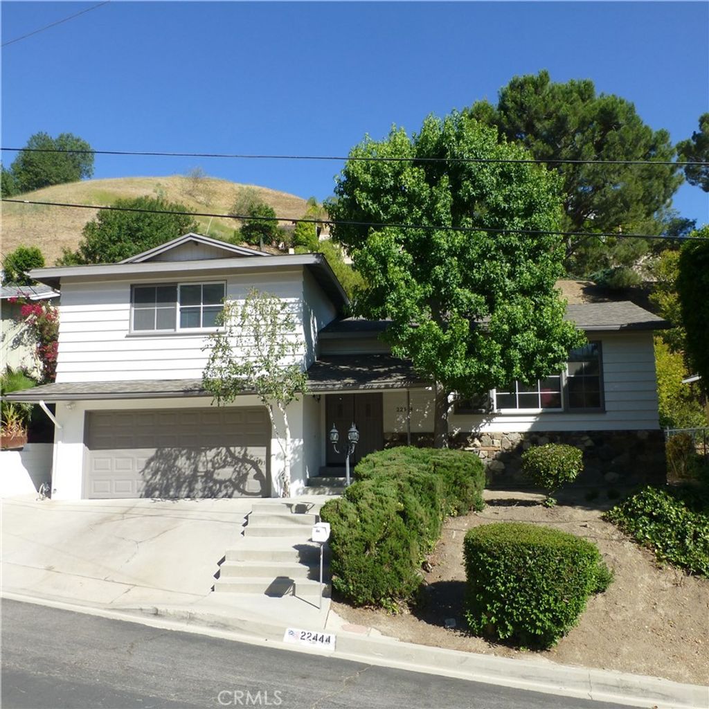 Photo of 22444 Domingo Road, Woodland Hills, CA 91364 (MLS # SR25167757)