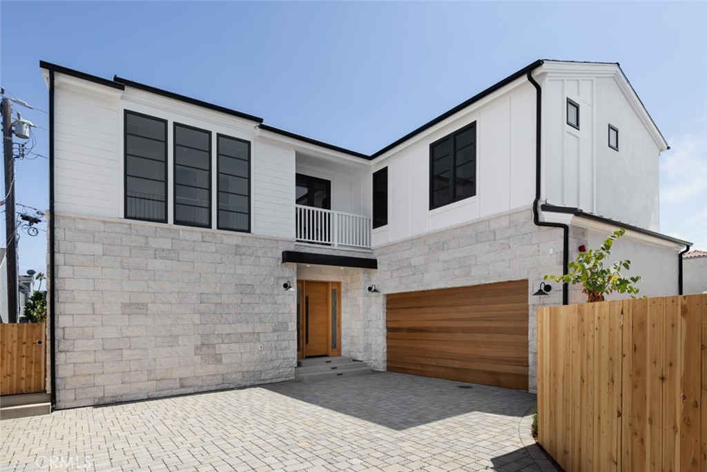 Welcome to the rare opportunity to own a brand-new contemporary residence in the heart of Eastside Costa Mesa. This thoughtfully designed 2,673-square-foot home embodies modern luxury, blending architectural elegance with effortless livability. An expansive open-concept layout is enhanced by soaring ceilings and walls of glass, bathing the interiors in natural light and creating an airy sense of volume throughout. Sophisticated finishes and clean-lined details elevate each space, striking the perfect balance between style and functionality. Designed with both entertaining and intimate everyday living in mind, the flowing floor plan offers versatile gathering spaces alongside private retreats for relaxation. Upstairs, generously sized bedrooms and spa-like baths offer comfort and privacy. The outdoor patio creates the perfect setting for entertaining or relaxing. Complete with an attached two-car garage and just moments from dining and shopping, experience the best coastal Orange County has to offer.