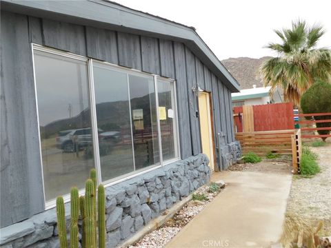 Photo of 73741 Serrano Dr, 29 Palms, CA 92277 (MLS # JT25274239)