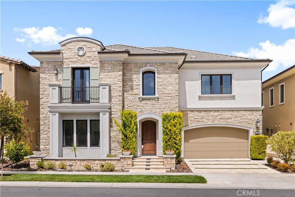 Nestled within the prestigious 24-hour staff-gated community of Altair, this stunning open-concept luxury home offers unparalleled comfort and sophistication. Boasting 5 spacious bedrooms, each with its own ensuite bathroom, and a total of 5.5 bathrooms, this residence provides the perfect balance of privacy and convenience. The first floor features a bedroom with an ensuite bathroom, along with a versatile space ideal for formal dining or a home office. Upstairs, a large loft serves as the perfect family room or entertainment area. The gourmet kitchen is a chef’s dream, featuring a grand island, stainless steel appliances, including a 48-inch gas cooktop, hood, double wall oven, microwave, and dishwasher. Soaring 10-foot ceilings on the main floor, 9-foot ceilings upstairs, and 8-foot interior doors enhance the home’s elegance and spaciousness. Brand new wood flooring adds warmth and charm throughout the house. This home also includes a 2-car garage and offers convenient access to the Great Park, major freeways, shopping, and local parks. As a resident, you’ll enjoy Altair’s exclusive HOA amenities, including a clubhouse, pool, and spa. Located in the award-winning Irvine Unified School District, this home is zoned for Beacon Park School and Portola High.
Discover the perfect blend of luxury, comfort, and location in this exquisite Altair residence.