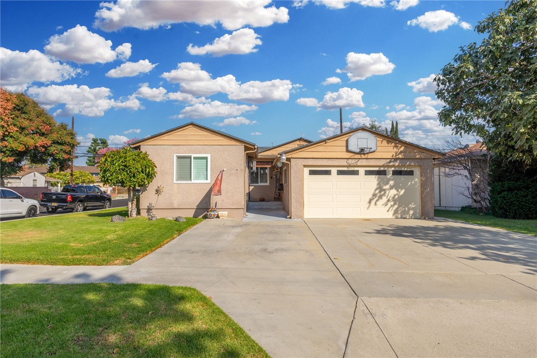 Welcome to 11402 Alburtis Ave, a beautifully maintained corner-lot home in a highly desirable neighborhood of Norwalk offering 4 bedrooms and 3 bathrooms across 1,684 sqft of living space. Perfect for multi-generational living or two families, this versatile home features a large, inviting family room ideal for gatherings, a gallery-style kitchen with granite countertops, and two bedrooms both with en-suite bathrooms for added comfort and privacy. Enjoy the comfort of central AC, the convenience of a 2-car garage, and the fully paid-off solar panels that will save you thousands every year on energy costs!! Every window is adorned with custom shutters, adding a touch of elegance and charm throughout. The backyard is low maintenance, private and features two patio coverings great for outdoor dining and entertaining guests. Nestled in a prime Norwalk location bordering Downey and Santa Fe Springs, this home offers the best of all three worlds. Conveniently located near the 5 and 605 freeway, shopping, parks, dining and schools (Whittier Union / Santa Fe High School). *Note: On title home is a 5 bedroom but is currently functioning as a 4 bedroom.