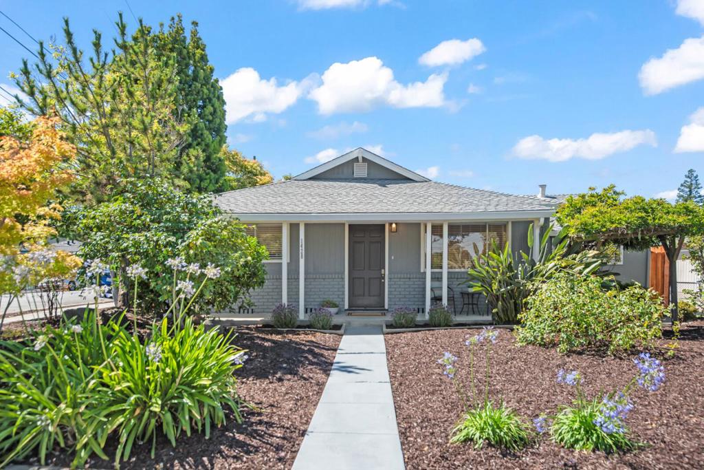 Located in desirable westside Redwood City, this beautifully updated 3+ bedroom, 2 bath home is the perfect blend of classic charm and modern style. Highlights Include: 3 large bedrooms + an office or potential 4th bedroom - Inviting living room - Separate dining room - Spacious family room with a fireplace - Updated kitchen and bathrooms - Gorgeous new plank flooring throughout - Recessed lighting - Huge backyard with a built-in brick barbecue and patio. Perfect for entertaining, gardening, play and relaxation - Detached, oversized 2 car garage with workbench and storage - Terrific location close to Red Morton Community Center, Roosevelt and Woodside Plaza shopping/restaurants, Downtown Redwood City, Caltrain and Hwy 101/280. Potential opportunity for an ADU/2nd living unit given the large lot and R-2 zoning. Don't miss this special property!