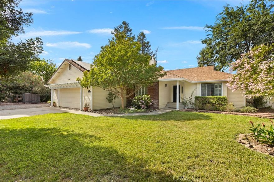 Quite home on large lot with stunning grounds and a rose garden perfect for wedding/ photo backdrop.Two Houses--A three bedroom, two bath house with POOL, OWNED SOLAR and HUGE detached GUEST/pool house - built in 2016 - with full kitchen, bath, bedroom, and office--would make a lovely large studio or office. As well as the two houses, there are also TWO detached music STUDIOS/OFFICES. Rich garden soils and many roses and fruit and shade trees. Pool house has its own gate and driveway and self-contained yard with barn/chicken coop. Music studio in shipping container has its own rooftop deck/stage. Brand new engineered leach line and $50k in septic upgrades installed July 2025. Well pump installed July 2025. On a quiet cul-de-sac near the intersection of Hicks Lane and Keefer Road, known for its peaceful horse estates and vineyards. Only 10 minutes to shopping, movie theater, the bustling art galleries and farmer's markets surrounding Chico State University. Pool house was built with permits and is 1,132 Square feet. Although fully self-contained, it was permitted as a pool house, not as a permanent residence - county records only show the 1,893 square feet of living space in the front house. Front house and pool house share one electric meter.  Large, level RV PARKING areas. Solar on both houses is fully OWNED and included in the sale.