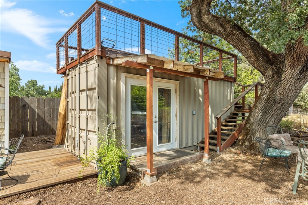 Quite home on large lot with stunning grounds and a rose garden perfect for wedding/ photo backdrop.Two Houses--A three bedroom, two bath house with POOL, OWNED SOLAR and HUGE detached GUEST/pool house - built in 2016 - with full kitchen, bath, bedroom, and office--would make a lovely large studio or office. As well as the two houses, there are also TWO detached music STUDIOS/OFFICES. Rich garden soils and many roses and fruit and shade trees. Pool house has its own gate and driveway and self-contained yard with barn/chicken coop. Music studio in shipping container has its own rooftop deck/stage. Brand new engineered leach line and $50k in septic upgrades installed July 2025. Well pump installed July 2025. On a quiet cul-de-sac near the intersection of Hicks Lane and Keefer Road, known for its peaceful horse estates and vineyards. Only 10 minutes to shopping, movie theater, the bustling art galleries and farmer's markets surrounding Chico State University. Pool house was built with permits and is 1,132 Square feet. Although fully self-contained, it was permitted as a pool house, not as a permanent residence - county records only show the 1,893 square feet of living space in the front house. Front house and pool house share one electric meter. Large, level RV PARKING areas. Solar on both houses is fully OWNED and included in the sale.