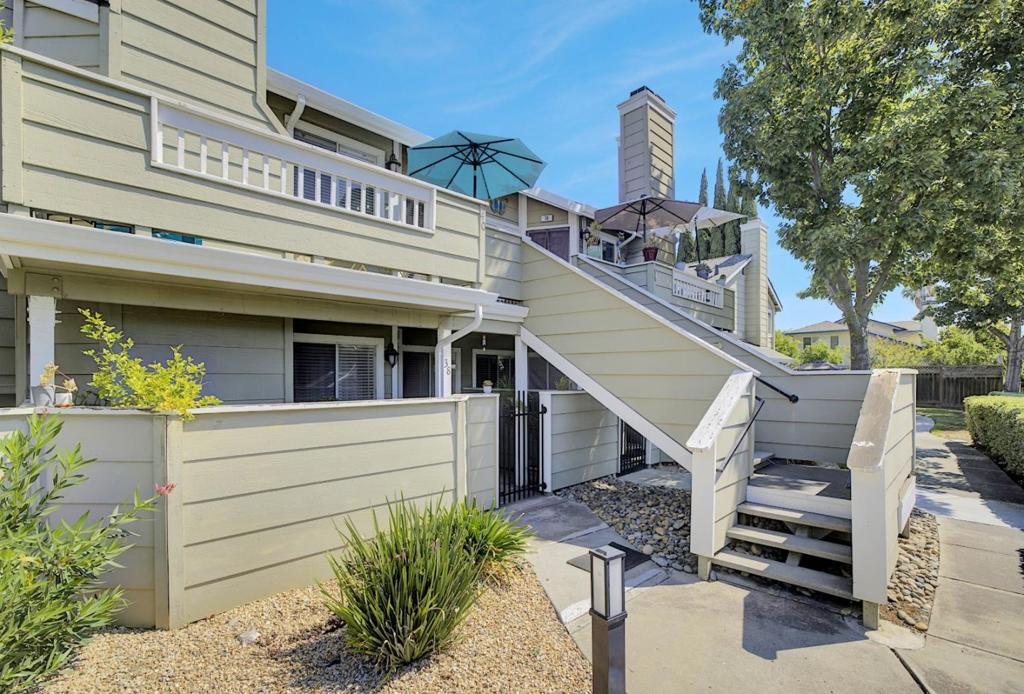 Welcome home to this bright, spacious, and stylish condo, nestled within a quiet, tree-lined community! This move-in ready home has been beautifully updated throughout with nice finishes. As you step inside, you'll be greeted by vaulted ceilings and an abundance of natural sunlight. This lovely home features 2-bedrooms, 2-bathrooms, and an open floor plan. It also includes fireplace, convenient inside laundry, an attached one-car garage, and an inviting outdoor balcony with views of the rolling hills. You'll also appreciate the extra parking pass for an additional car. Home is conveniently located near Highways 85,101 and 87, making commuting a breeze. Don't miss out on the opportunity to make this condominium, your new home!