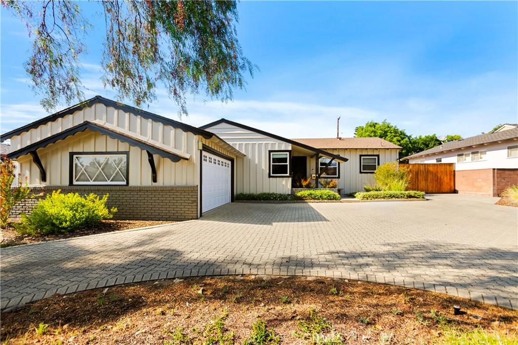 Welcome to this spectacular pool home in desirable North Glendora! From the moment you step inside, you're greeted by a bright, open-concept layout with views of the backyard and sparkling pool. Sunlit rooms, warm paint tones, and beautiful hardwood floors create a welcoming and comfortable atmosphere. The home features generously sized bedrooms filled with natural light, and both bathrooms have been tastefully remodeled with modern finishes. The updated kitchen offers a perfect blend of style and functionality, ideal for everyday living or entertaining.
Additional highlights include upgraded dual-pane windows, a laundry room, a fireplace, a freshly painted exterior, and ample space for RV parking. In the backyard, you'll find an air-conditioned flex space—ideal as a home office, art studio, or workshop. The lush yard is a true retreat, featuring a variety of mature fruit trees including orange, avocado, lemon, lime, pomegranate, peach, and nectarine. Located within walking distance to charming Glendora Village, parks, public transit, and top-rated schools, this home offers the perfect blend of comfort, convenience, and California living.