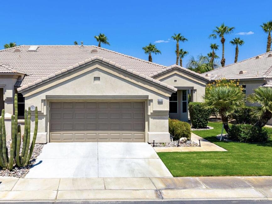 Perfectly positioned on the 3rd green of Heritage Palms golf course, this beautifully renovated home offers an intimate golf experience right from your patio as well as sweeping fairway and mountain views, in a coveted 55+ resort community. This beautifully updated home offers 2 bedrooms/2 baths, and an open concept layout making it a light and bright living experience.The stunning kitchen is a true highlight, featuring sleek quartz countertops, crisp white cabinetry, stainless steel appliances, and a custom tile backsplash. A spacious utility room provides additional storage and even space for a small office nook. Smart Home features allow you to manage your home from anywhere, making it an ideal seasonal retreat or low-maintenance year-round residence.As an added bonus, a golf cart is included, so you can easily access the community's outstanding amenities.Living in Heritage Palms means enjoying a 55+ active adult community with 24 hour security and exceptional amenities: an 18-hole championship golf course, clubhouse with restaurant and lounge, fitness center, indoor and outdoor pools, pickleball and tennis courts, billiards, library, and a vibrant calendar of social events and clubs.Whether for the season or year-round, this home offers the perfect blend of style, comfort, and resort-style living.