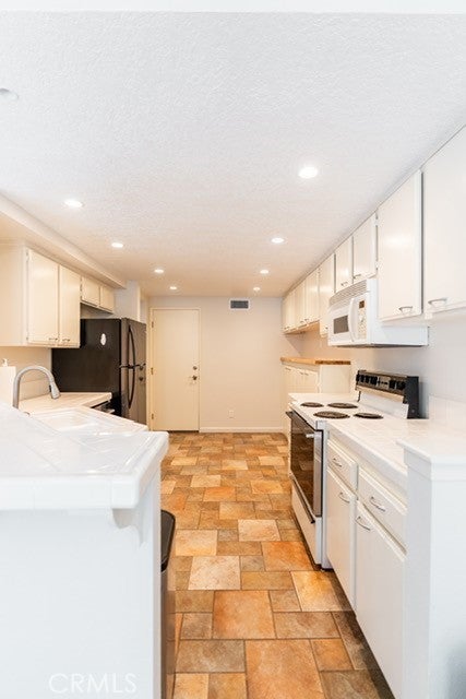 Photo of 2154 San Michel Dr W #A DR, Costa Mesa, CA 92627 (MLS # PW26193496)