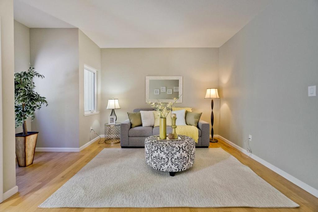 Beautiful updated end-unit 2 bedrooms + Den & 2.5 bathrooms townhome with a spacious yard situated in the heart of Campbell. Desirable floorplan with separate dining area and living room looking out to the well landscaped backyard which is one of the large lots in the complex. Mature apple and orange trees. Remodeled kitchen enhanced by new granite countertops, glass tile back splash, stainless steel appliances, refinished cabinets. The Den/Office and the half bathroom are on the ground floor. The 2 bedrooms, 2 bathrooms and separate laundry room are upstairs. Each bedroom has a spacious walking closet. Newer windows in the home are good for insulation. The light and bright home sparkles with new interior paint and new carpet. Attached 2-car garage with a lot of storage area. The home is close to major commutes, 5 mins to downtown Campbell & Los Gatos, parks, Los Gatos Creek Trail, easy access to highway, 5 mins to Netflix, restaurants, shopping plaza.