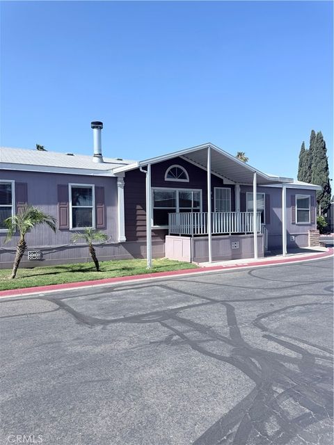 Photo of 1855 RIVERSIDE DR #405, Ontario, CA 91761 (MLS # IV26102848)