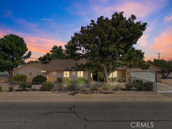 Beautiful home listed in the desired area of Hesperia, This home is on a very spacious corner lot. The property is completely fenced in. This home features two primary bedroom suites. The home has 3 bedrooms and 3 bathrooms, with a bonus room that could also be used as an bedroom. The room additions is not permitted and not included in the square footage. This home is great for large families that need the extra space. This home is definitely a must see.