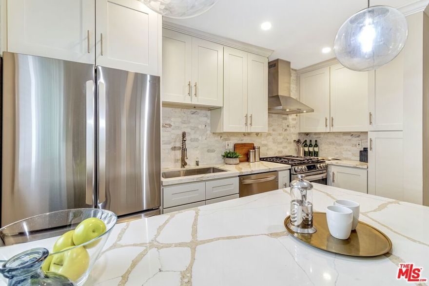Perfectly positioned within West Hollywood's cherished Norma Triangle neighborhood, this completely renovated condominium offers the ideal blend of convenience and style. Located just two blocks from Beverly Hills and two blocks from the vibrant Sunset Strip, you'll have easy access to Santa Monica Boulevard, world-class dining, shopping, nightlife, and all the area's best offerings. This cozy and thoughtfully designed space has elegant flooring and modern finishes throughout. A sleek, upgraded kitchen featuring new countertops and stainless steel appliances, including a refrigerator, stove, dishwasher, wine fridge, and microwave, is ideal for culinary creativity. The fully renovated bathroom showcases contemporary fixtures, generous storage, and a separate tub/shower combination. The serene bedroom offers a peaceful retreat, complete with a spacious walk-in closet to meet all your storage needs. Every detail has been carefully considered to maximize both function and elegance. Conveniently located in the center of the courtyard, close to the pool, it has easy access to the elevator, community garage, and newly remodeled fitness room/gym. Gated parking with an assigned parking spot has a place for extra storage. HOA dues include gas and water utilities. Located near West Hollywood Park, WeHo Library, and Cedars-Sinai Hospital, this turnkey condo in one of L.A.'s most dynamic and walkable communities is a rare opportunity not to be missed. Easy to schedule a showing or video tour.