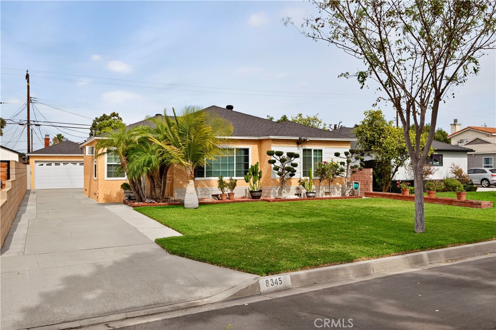 Nestled in the heart of Downey, this charming home sits on a quiet cul-de-sac, offering privacy, comfort, and excellent curb appeal.
The residence features 4 bedrooms and 3 bathrooms. Upon entry, you’re welcomed by tile flooring in the living room, followed by a dining area that flows seamlessly into a spacious kitchen. The hallway and bedrooms are finished with laminate flooring throughout. Two bedrooms include their own private en-suite bathrooms, while a hallway bath conveniently serves guests and the remaining bedrooms. Step outside to a covered patio, perfect for entertaining or relaxing.
A detached two-car garage offers plenty of storage and parking, complemented by additional driveway space. Enjoy a variety of fruit trees on the property, such as orange, avocado, mango, lemon, and tangerine.
Ideally located within walking distance of Downey Landing, Stonewood Mall, Downey High School, Warren High School, and other popular destinations.