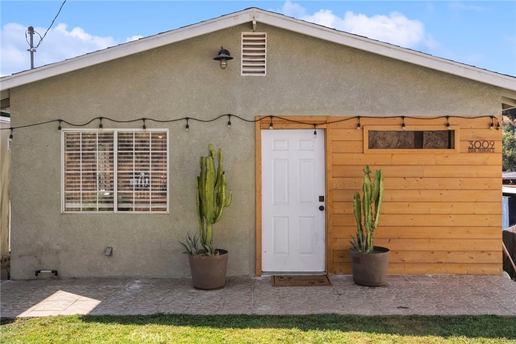 Come see this gorgeous home in Lincoln Heights! On the main level you’ll find an entryway leading to an open concept kitchen and dining area, two bedrooms and full bath. Downstairs you’ll walk into an adorable reading nook, full size laundry room and basement access. Two additional downstairs bedrooms and a bathroom extend from the back of the house, each with their own exterior access door. Create a work-from home setup, or move the entire primary suite downstairs for extra privacy. Convert the additional 760sf below into an ADU for rental income, or enjoy “in-law” life. A massive yard slopes downward from the house, providing plenty of space for fruit trees, outdoor entertaining, or significantly expanding the home’s footprint. To accommodate the realities of hillside living, the home has been fully pest-proofed both inside and along the exterior perimeter, ensuring protection from local wildlife. The original foundation beneath the historic core of the house has been reinforced with beams. The property boasts new air conditioning and heating on the upper level, brand new flooring throughout, fresh baseboards and a full repaint of common areas. Additional highlights include a soaking tub in the downstairs bathroom, updated lighting fixtures and front yard landscaping with automatic sprinklers. Ask about the FHA assumable loan at 3.25%! You may also qualify for a $20,000 homebuyer grant to buy this home. Enjoy watching the hawks fly over you, facing Paradise Hill on this quiet street in NELA.