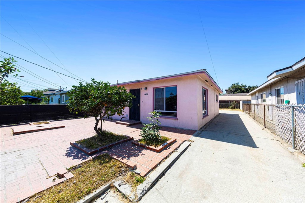 Charming single-level home offering 2 bedrooms and 1 bath with approx. 840 sq. ft. of living space. Situated on an Approx. 3,200 sq. ft. lot, this property provides a great opportunity for buyers looking to personalize or invest. The home features a functional floor plan, plenty of natural light, a one-car garage located behind the Home with a long Driveway, conveniently located near schools, shops, and much more! This Property is a Must-See!