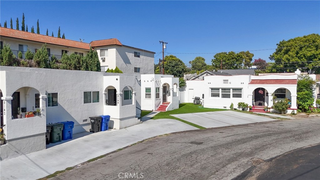Fully rented & recently renovated 4-unit gem is ready to generate income from day one! This extensively upgraded property offers minimal ongoing maintenance, combining income stability with long-term ease of ownership. The original single-level duplex at 8146 & 8148 Bright Ave features no shared walls. 8148 offers 2 bedrooms, 1 bathroom, and a 2-car garage, while 8146 has 1 bedroom, 1 bathroom, a private patio, and 1 assigned parking space. The newly constructed 2-unit ADU provides 800 sq.ft. per unit, each with 2 bedrooms, 2 bathrooms, 2 parking spaces, and modern efficiency upgrades including fully owned solar panels. All four units are single story with no one above or below, and feature laminate wood floors, updated cabinetry, mini-split HVAC systems, and more. With recent renovations and new construction, owners can enjoy years of low-maintenance operation in a convenient location near grocery stores, restaurants, and retail shops. Contact the listing agent today for full details.