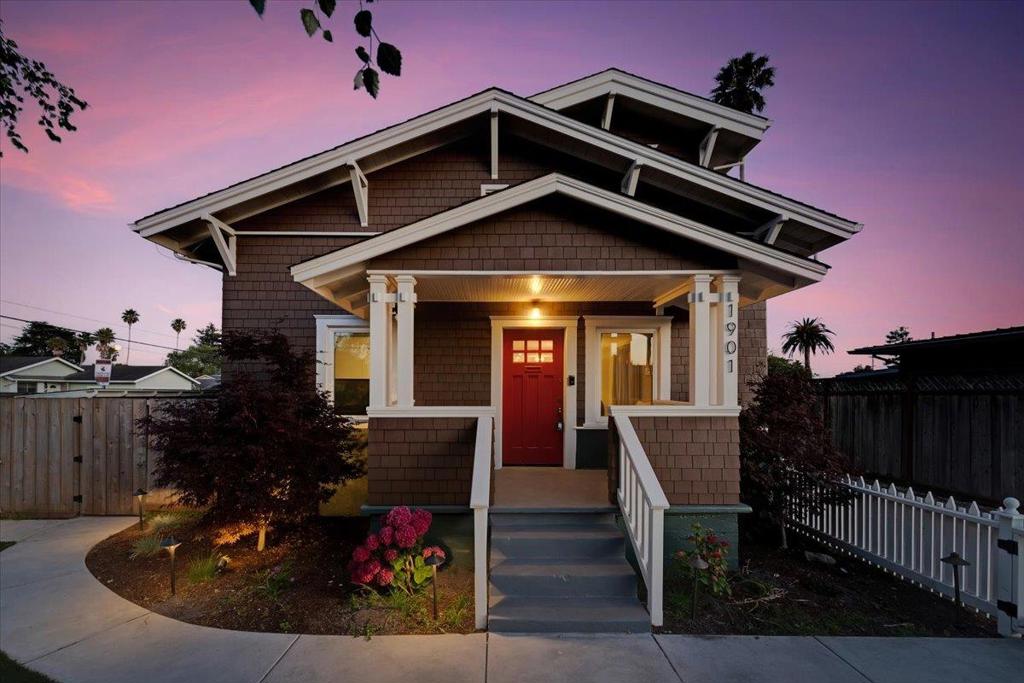 A fully reimagined coastal Craftsman just three blocks from the ocean, 1901 Delaware blends timeless architecture with elevated, modern living. Thoughtfully redesigned throughout, this turnkey Westside property features a custom chefs kitchen with luxury appliances, handcrafted cabinetry, wide-plank flooring, and spa-inspired bathrooms with curated finishes. The flexible layout includes multiple bonus rooms and a stunning upstairs retreat with vaulted ceilings, a fireplace sitting area, and a private balcony. Downstairs, French doors off the kitchen open to a sunlit deck overlooking the expansive, landscaped yard. A beautifully finished 400 sq. ft. detached studio offers space for work, wellness, or creative use. All just moments from West Cliff, Natural Bridges, and the best of Santa Cruz living.