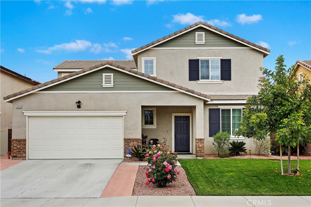 Pride of ownership shows at 29350 Wild Lilac located in the highly sought after Summerly Community of Lake Elsinore. This 2309 square foot home has four bedrooms and three bathrooms. The primary suite hosts a beautiful en-suite bathroom along with a large walk in closet. One bedroom is located downstairs along with a full bathroom! This home offers luxury plank flooring throughout with new carpet in the bedrooms, paid off solar, a tankless water heater, granite countertops in the kitchen with an oversized island, stainless steel appliances, a walk-in pantry, granite countertops in all bathrooms, indoor laundry, ample storage, an alumawood patio cover with stamped concrete and beautiful easy to maintain landscaping. Both the interior and exterior of this home have been recently painted. The association at Summerly offers a pool, clubhouse, walking paths, gardens, parks with two baseball fields, basketball court, soccer field and skate park. The clubhouse is about a 5 minute walk from the home. The Storm Stadium is about a ten minute walk for easy game enjoyment! Summerly is conveniently located close to restaurants, shopping centers, farmers markets, schools, and the 15 freeway.